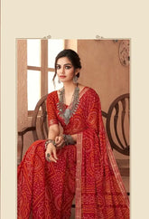 India Silk Red Chiffon Saree Features A Beautifully Attached Banarasi Border Combining The Softness And Flow Of Chiffon